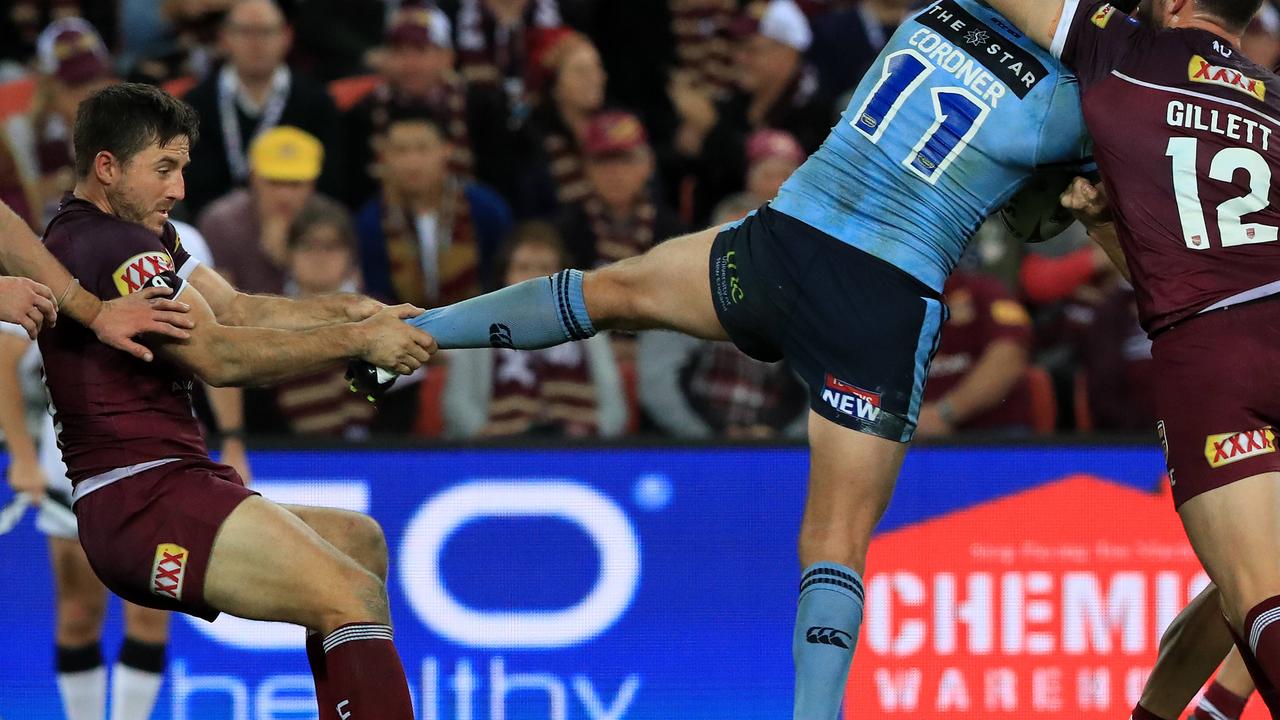 Boyd Cordner is grabbed by Ben Hunt who then throws his boot away during the Origin opener.