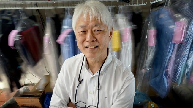 Eddie Chan at his dry cleaning business in Kew. Picture: Andrew Henshaw