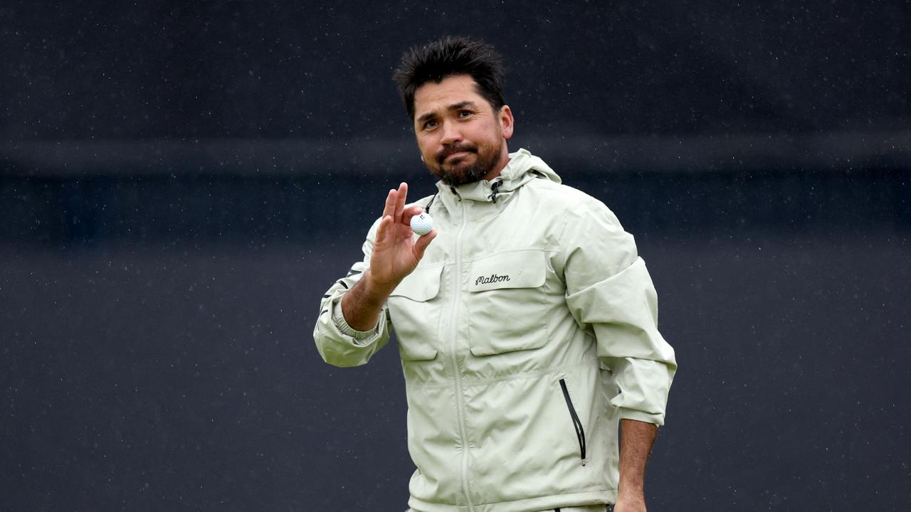 TROON, SCOTLAND - JULY 20: Jason Day of Australia acknowledges the crowd on the 18th green during day three of The 152nd Open championship at Royal Troon on July 20, 2024 in Troon, Scotland. (Photo by Harry How/Getty Images)