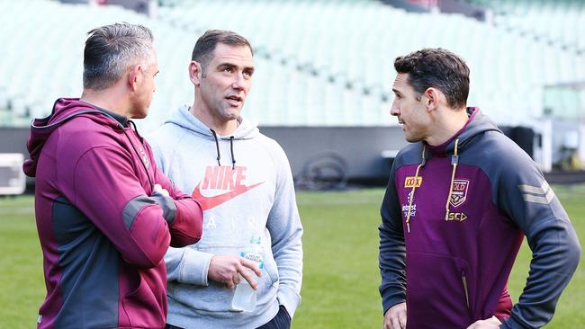 Maroons legend Cameron Smith (C) chats with Billy Slater (R), with whom he’ll form a formidable coaching duo this year. Picture: Getty