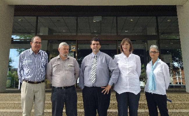 Chamber of Commerce president Jeremy Challacombe (left), CHESS employment manager Jock McNamara, Mayor Richie Williamson, North Coast rapid response team co-ordinator Chris Pauling and community programs client services manager Annette Rushby discuss assistance available for displaced abattoir workers.