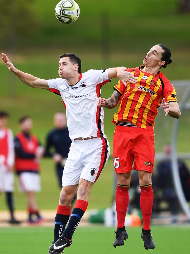 Liam Wooding (right) playing for MetroStars against South Adelaide in June for the first time since leaving the Panthers. Picture: AAP/Mark Brake