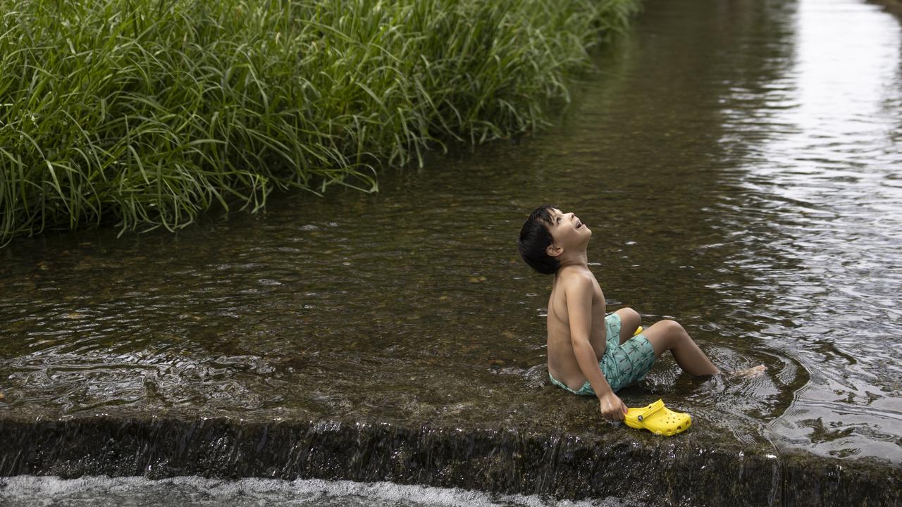 Joe Murphy, 6 cools down in the River Darent in Eynsford, United Kingdom as Britain a record heatwave. Picture: Getty Images