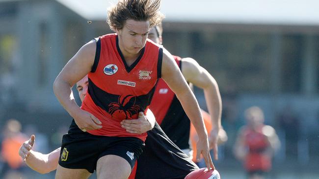 RDFL: Romsey versus Riddell at Tony Clarke Reserve, Macedon Romsey's Ahmed Taha,30 and Riddell's Nicholas Ash,9 Pictures:Angie Basdekis