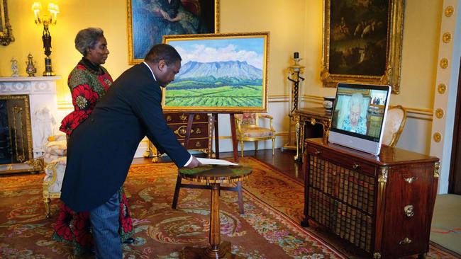 Queen Elizabeth II appears on a screen via videolink from Windsor Castle in her first public event since recovering from Covid. Picture: Getty Images.