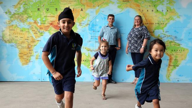 Pupils Agamdeep Chhatwalis, 9, Gracie Smith, 3, Riley Bettiol, 13, Penelope Buere, 5, with assistant principal Michelle O’Leary. Picture: Jane Dempster 