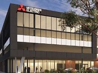 Artist's impression of Mitsubishi Electric at Victoria Rd Rydalmere. Demolition, tree removal, remediation works and construction of a part four-storey industrial building including car parking for 285 vehicles with ancillary signage.