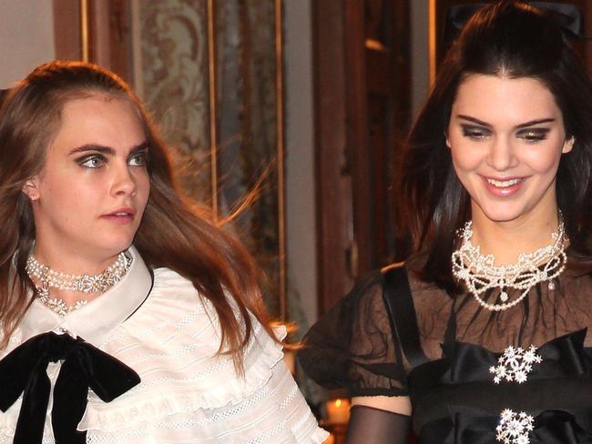 SALZBURG, AUSTRIA - DECEMBER 02: Model Cara Delevigne and Kendall Jenner during the Chanel Metiers d'Art Collection 2014/15 Paris-Salzburg on December 2, 2014 in Salzburg, Austria. (Photo by Gisela Schober/Getty Images)
