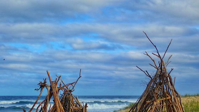 Driftwood huts at Urunga, snapped by Bronwyn Hawkes.