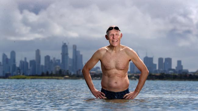 ‘I’m so conscious that it’s really important to keep moving’ … Don Warner, 67, after braving the chilly water at Melbourne’s Brighton Beach. Picture: David Geraghty