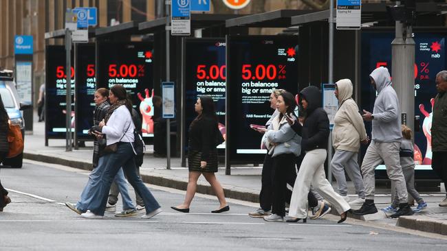 SYDNEY, AUSTRALIA : Newswire Photos- JULY 16 2024: A general stock photo of people crossing York Street at Wynyard Station alongside the bus stops in the Sydney CBD near Wynyard Station. Picture: Newswire /Gaye Gerard