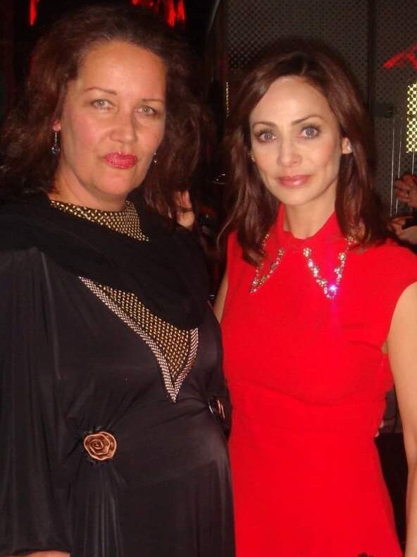 Pylka pouts in a picture with Natalie Imbruglia.