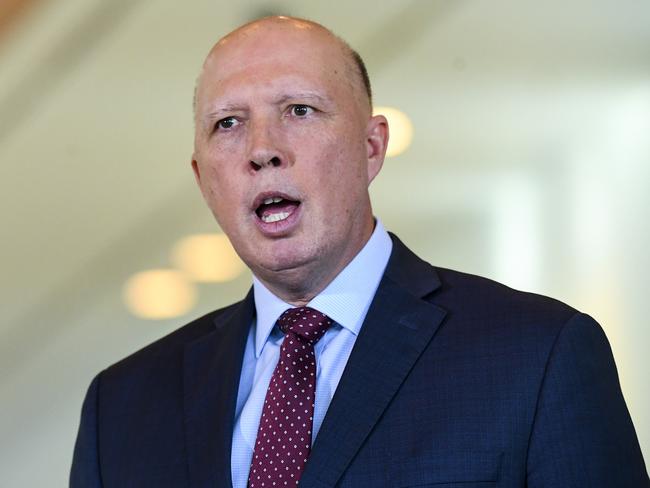 Australian Home Affairs Minister Peter Dutton speaks to the media during a press conference at Parliament House in Canberra, Thursday, May 14, 2020. (AAP Image/Lukas Coch) NO ARCHIVING