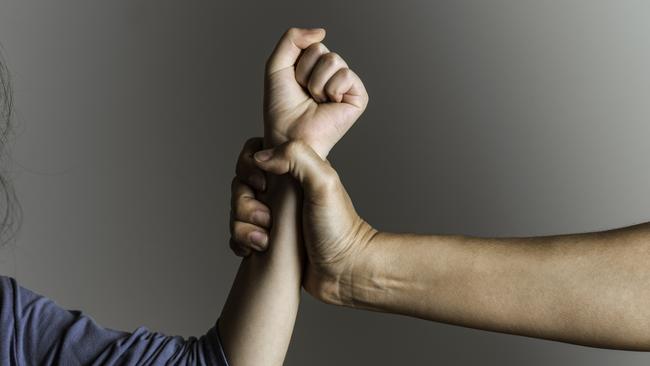 istock generic:  woman, abuse, DV, domestic violence, harassment, sexual harassment.   Parent is holding her little girls arm and is about to use violence. Representing child abuse and domestic violence. . Picture: istock