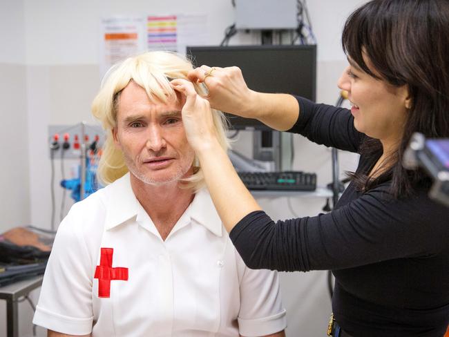 Dave Hughes jumps into his naughty nurse character. Picture: Mark Stewart