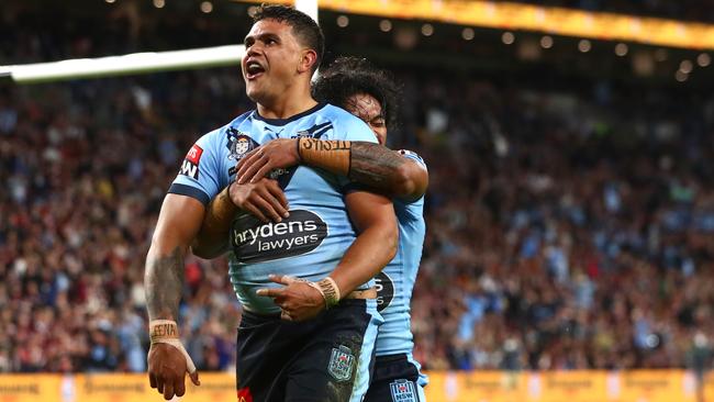 BRISBANE, AUSTRALIA - JUNE 27: Latrell Mitchell of the Blues celebrates after scoring a try during game two of the 2021 State of Origin series between the Queensland Maroons and the New South Wales Blues at Suncorp Stadium on June 27, 2021 in Brisbane, Australia. (Photo by Chris Hyde/Getty Images)