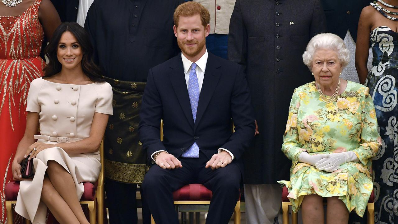 Queen Elizabeth, Prince Harry and Meghan, Duchess of Sussex. Picture: John Stillwell