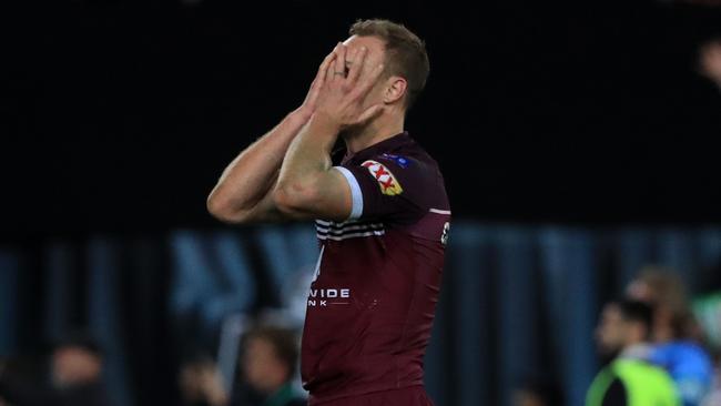 A shattered Daly Cherry-Evans reacts after full-time. Picture: Adam Head