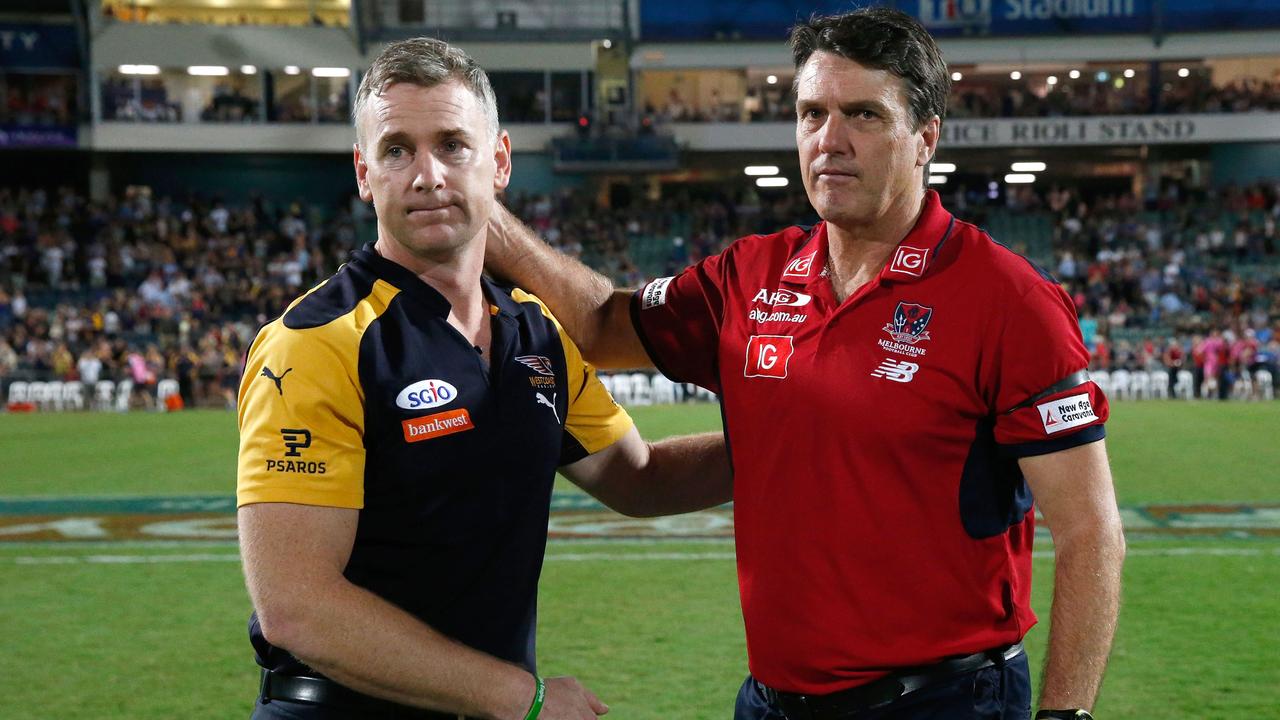 DARWIN, AUSTRALIA - JULY 4: Adam Simpson, Senior Coach of the Eagles and Paul Roos, Senior Coach of the Demons embrace after the 2015 AFL round 14 match between the Melbourne Demons and the West Coast Eagles at TIO Stadium, Darwin, Australia on July 4, 2015. (Photo by Michael Willson/AFL Media/Getty Images)