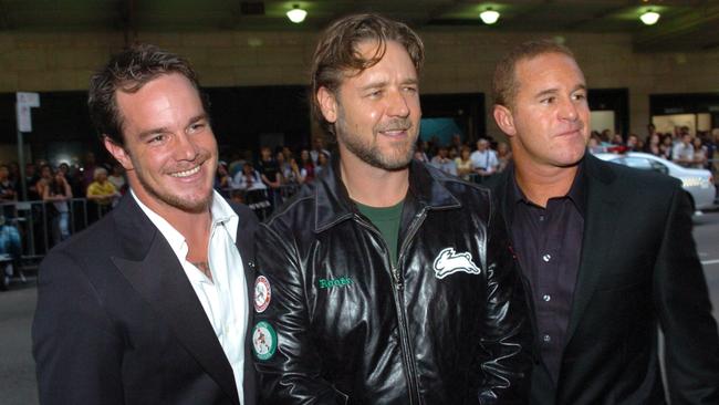 Actor Russell Crowe (centre) with Bra Boys figureheads, surfing star Koby Abberton (left) and Sunny Abberton at the premiere of the film Bra Boys.