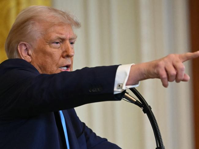 TOPSHOT - US President Donald Trump speaks during a press conference with unseen Israel's Prime Minister Benjamin Netanyahu in the East Room of the White House in Washington, DC, on February 4, 2025. (Photo by ANDREW CABALLERO-REYNOLDS / AFP)