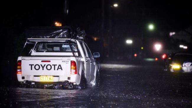 A car makes its way through the wild weather on Monday night. Picture: Darren Leigh Roberts.