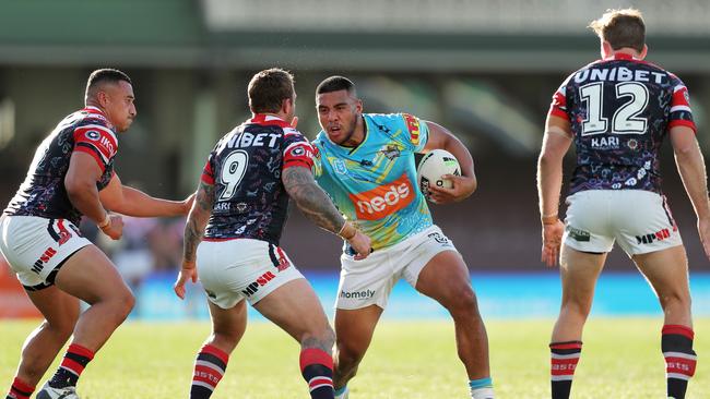 SYDNEY, AUSTRALIA - AUGUST 01: Moeaki Fotuaika of the Titans is tackled during the round 12 NRL match between the Sydney Roosters and the Gold Coast Titans at the Sydney Cricket Ground on August 01, 2020 in Sydney, Australia. (Photo by Matt King/Getty Images)