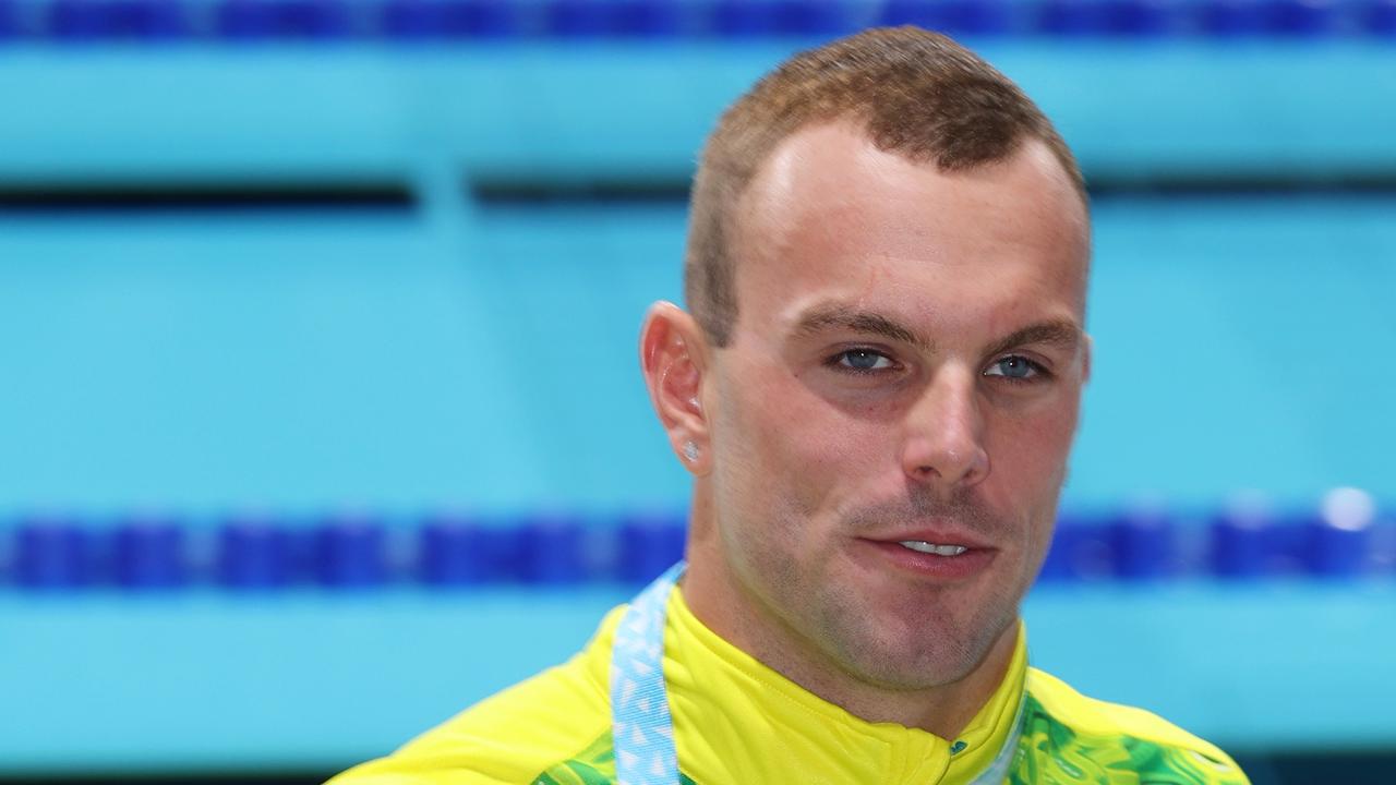 SMETHWICK, ENGLAND - AUGUST 01: Gold medalist, Kyle Chalmers of Team Australia poses with their medal during the medal ceremony for the Men's 100m Freestyle Final on day four of the Birmingham 2022 Commonwealth Games at Sandwell Aquatics Centre on August 01, 2022 on the Smethwick, England. (Photo by Clive Brunskill/Getty Images)