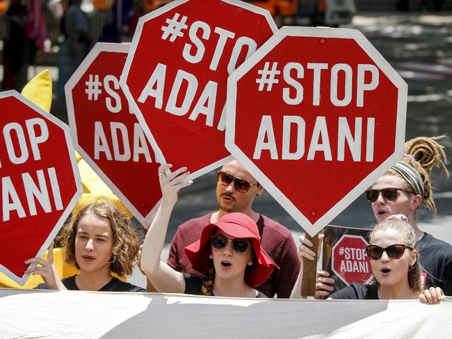 Protesters are seen outside the Queensland Resources Council in Brisbane on November 21. Picture: Glenn Hunt/AAP