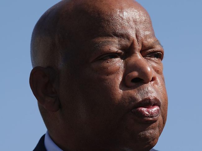 (FILES) In this file photo taken on September 24, 2017 U.S. Rep. John Lewis (D-GA) listens during a news conference September 25, 2017 on Capitol Hill in Washington, DC. - John Lewis, the non-violent civil rights warrior who marched with Martin Luther King Jr and nearly died from police beatings before serving for decades as a US congressman, has died at age 80, House colleagues said July 17, 2020. In December 2019, he was diagnosed with pancreatic cancer. (Photo by ALEX WONG / GETTY IMAGES NORTH AMERICA / AFP)