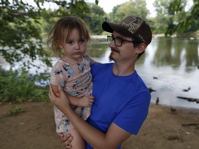 Scott Toth, who is preparing to vote for the first time, with niece Aurora. Picture: Josh Birt