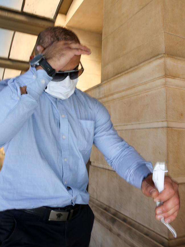 Moujtaba Joubouri leaves court in Adelaide after an earlier appearance. Picture: Brett Hartwig