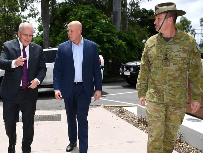 Scott Morrison and Peter Dutton visit the Gallipoli Barracks in Brisbane. The Brigade are assisting with the recovery from recent floods in Queensland. Picture: Dan Peled