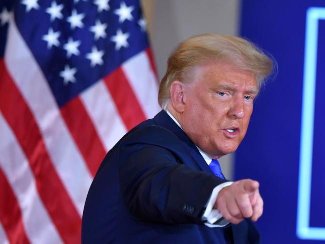 US President Donald Trump gestures after speaking during election night in the East Room of the White House in Washington, DC. He has not admitted defeat. Picture: AFP