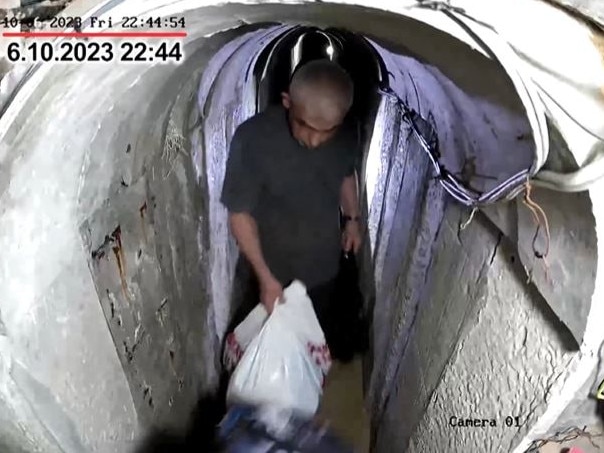 The Israel army has released footage it says shows Hamas leader Yahya Sinwar fleeing underground before the October 7 attack.