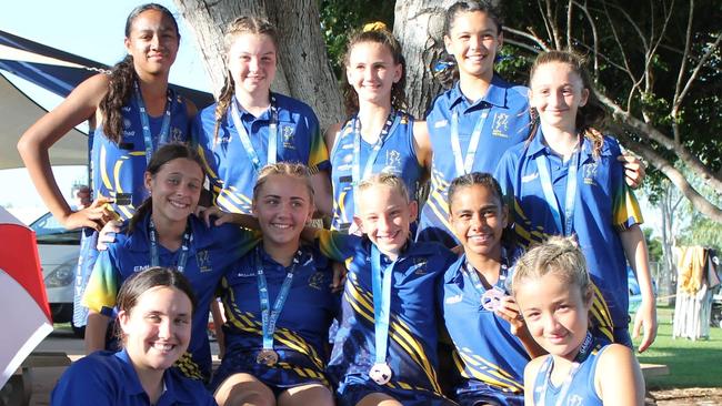 The Townsville U13 netball team coached by Kayla Watson (bottom left).