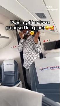 Plane passenger proposes to girlfriend mid-flight using PA system
