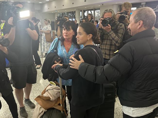 People travelling on-board the Qatar mercy flight helping Australians flee Israel landed in Sydney on Tuesday afternoon. Picture: Madeleine Bower