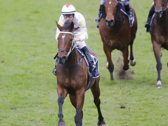 SYDNEY, AUSTRALIA - JULY 16: William Pike on Frumos wins race 9 the China Horse Club Handicap during Sydney Racing at Rosehill Gardens on July 16, 2022 in Sydney, Australia. (Photo by Jenny Evans/Getty Images)