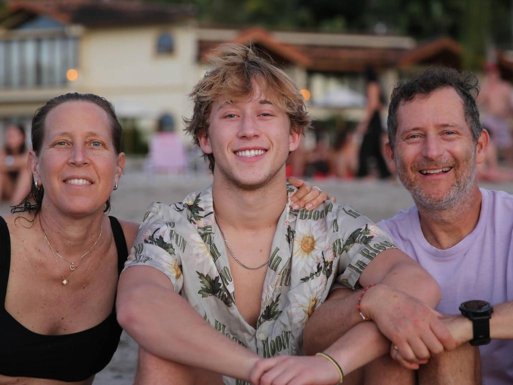 Troper with his parents, Susan Wojcicki and David Troper. Picture: Supplied