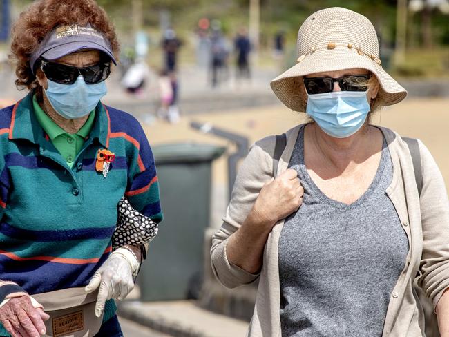 Victorians must still wear face masks, even if alone or with others outside. Picture: David Geraghty/NCA NewsWire