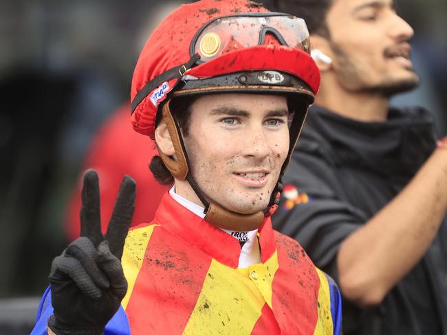 KEMBLA GRANGE, AUSTRALIA - NOVEMBER 20: Tyler Schiller on Eleven Eleven returns to scale after winning  race 7 the Traffic Logistics The Warra during Sydney Racing at Kembla Grange Racecourse on November 20, 2021 in Kembla Grange, Australia. (Photo by Mark Evans/Getty Images)