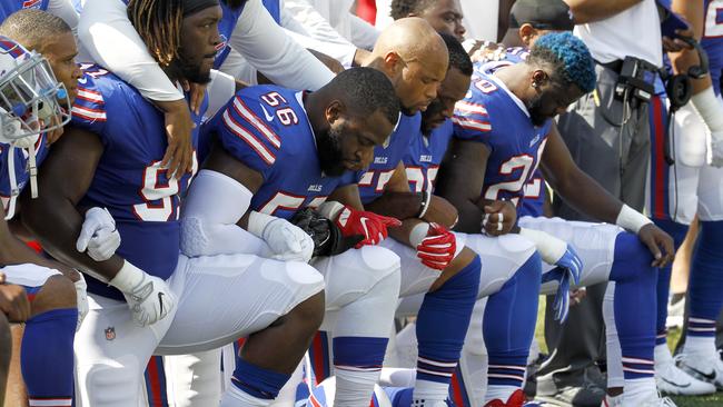 Buffalo Bills players kneel during the national anthem. Pic: AP