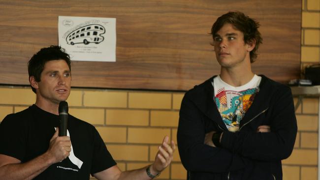 Shane Crawford and Tom Hawkins talk at Finley in 2008.