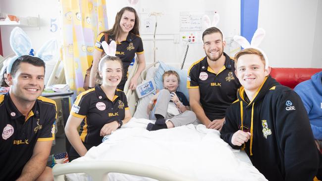 Hayden with Tigers football players Jake Doran, Marla Neal, Maddy Barr, Marcus Davies and Patrick Kelly. Picture: RICHARD JUPE