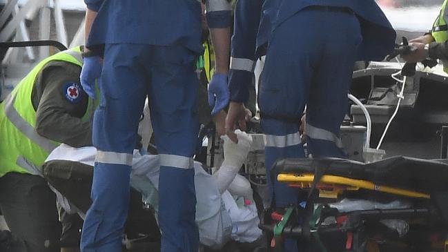 A survivor at Sydney Airport. Picture: AAP