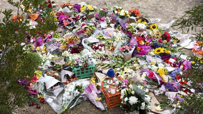 Floral tributes for Aiia near the Polaris Shopping Centre. Picture: AAP