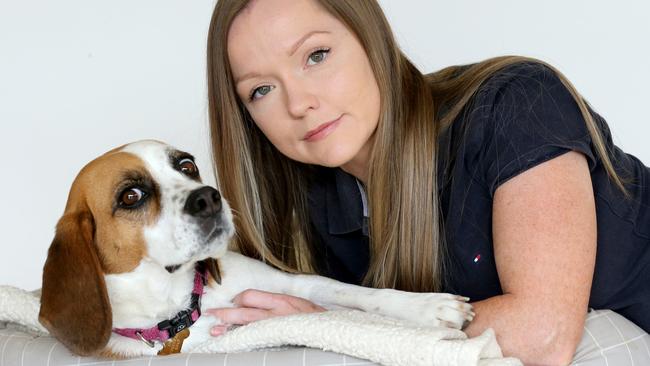 Lauren Burton and her beagle Belle were attacked by a large dog on the Gold Coast. Picture Mike Batterham