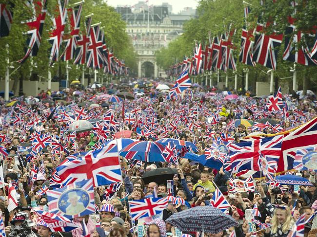 Huge crowds cheering with Britain’s Union flags crowd the Mall towards Buckingham Palace to celebrate the Queen’s Diamond Jubilee in London on June 5, 2012. Picture:AFP