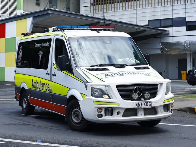 A Queensland Ambulance departs the emergency department of the Cairns Hospital on the Esplanade. Picture: Brendan Radke